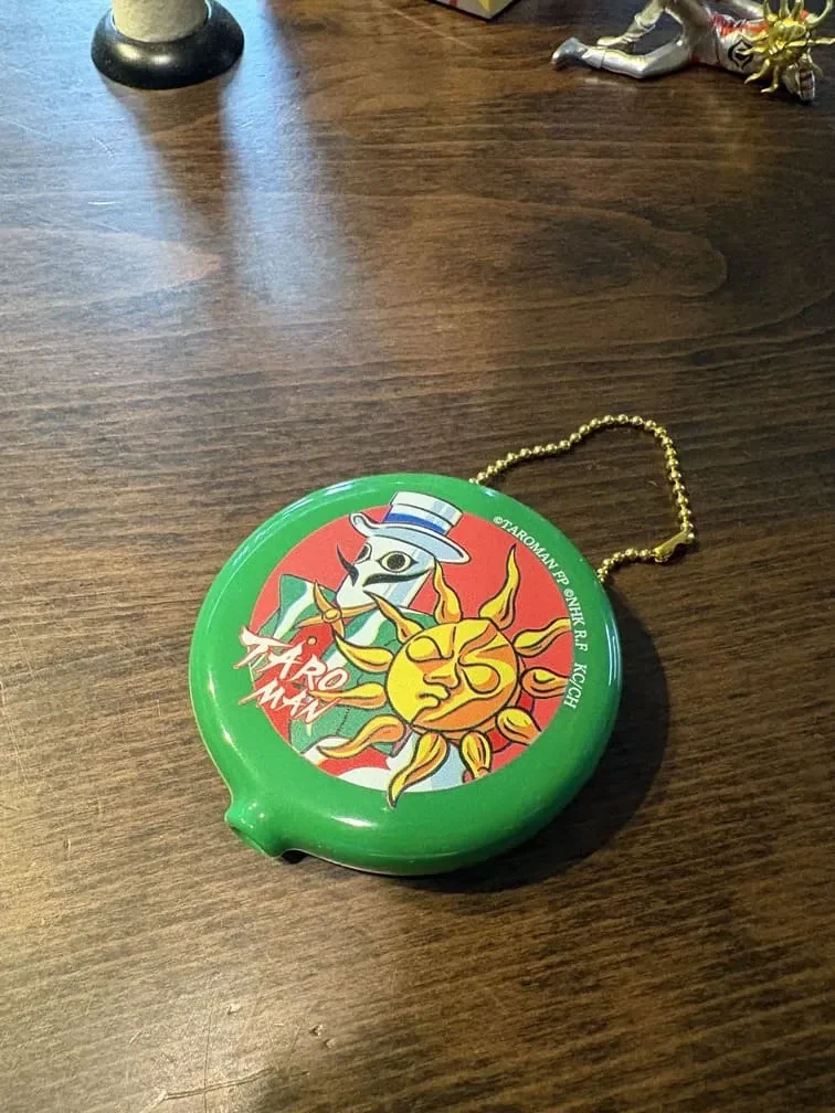 岡本太郎美術館のガチャガチャで出たタローまんのコインケース