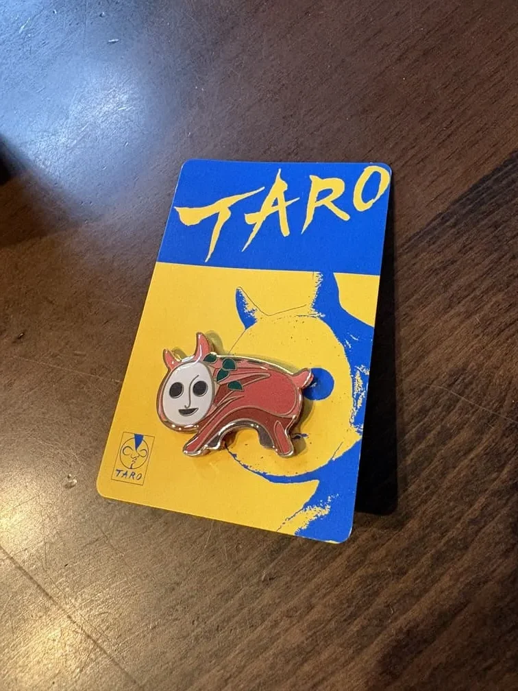 「犬の植木鉢」のピンバッジ